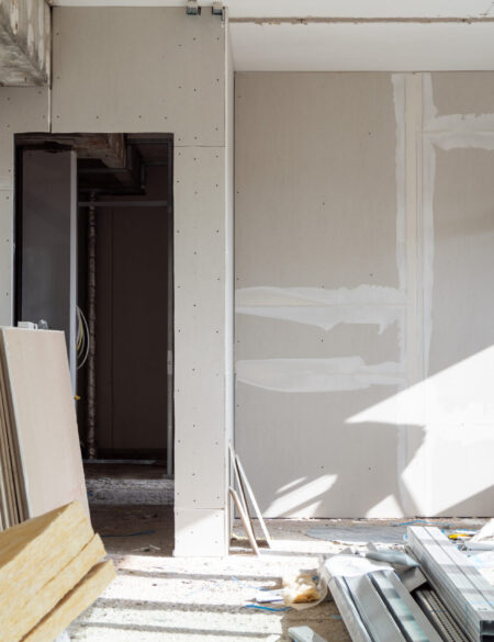 Home renovation project showing insulation and wall work.