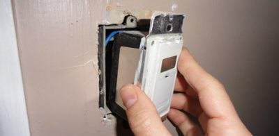 Installing a programmable timer switch in a wall electrical box