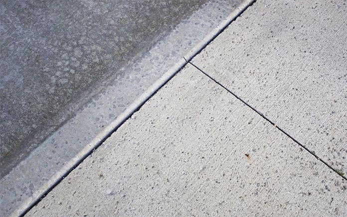 Closeup of a concrete slab with control joints