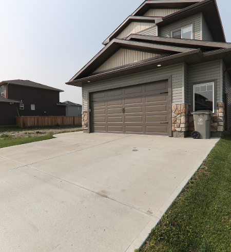 a concrete driveway repair for a residential home
