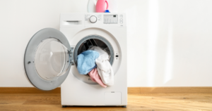 Photo of a washing machine with clothes